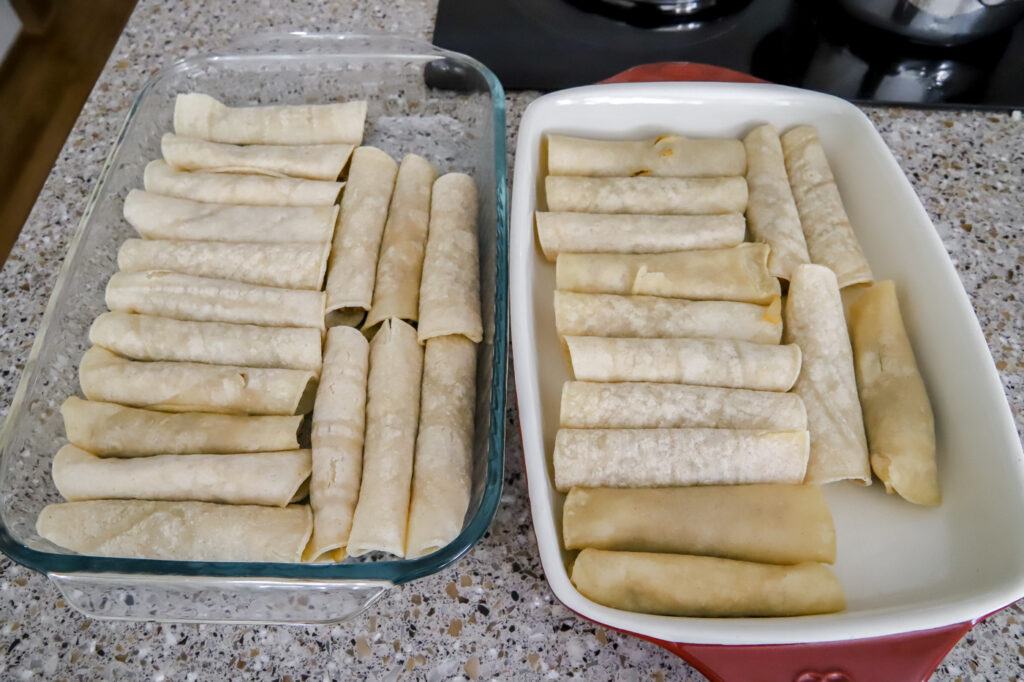 Two pans of beef enchiladas