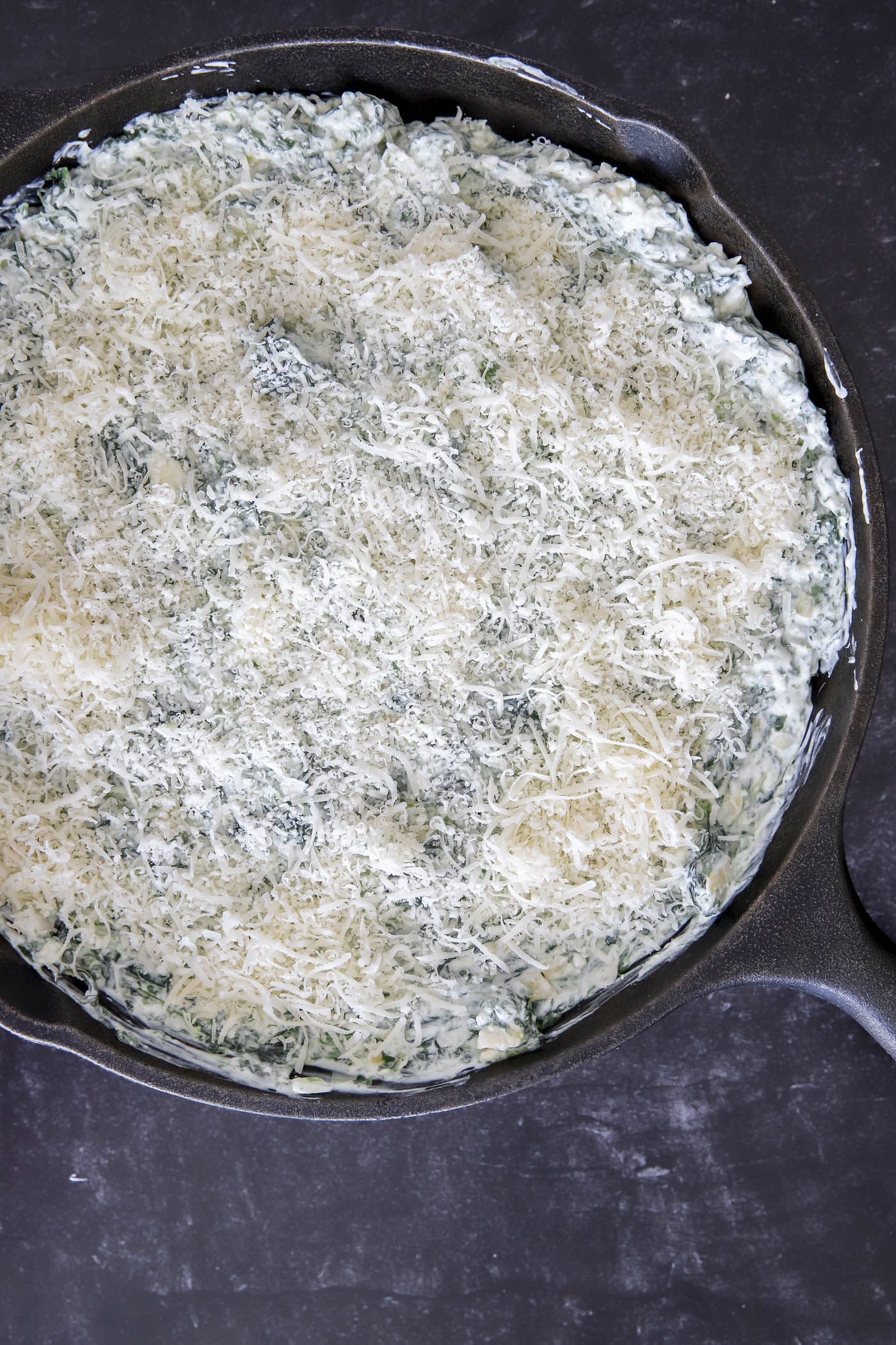 Add spinach dip to cast iron skillet
