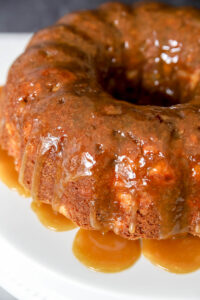 caramel apple Bundt cake with caramel drizzle on top.