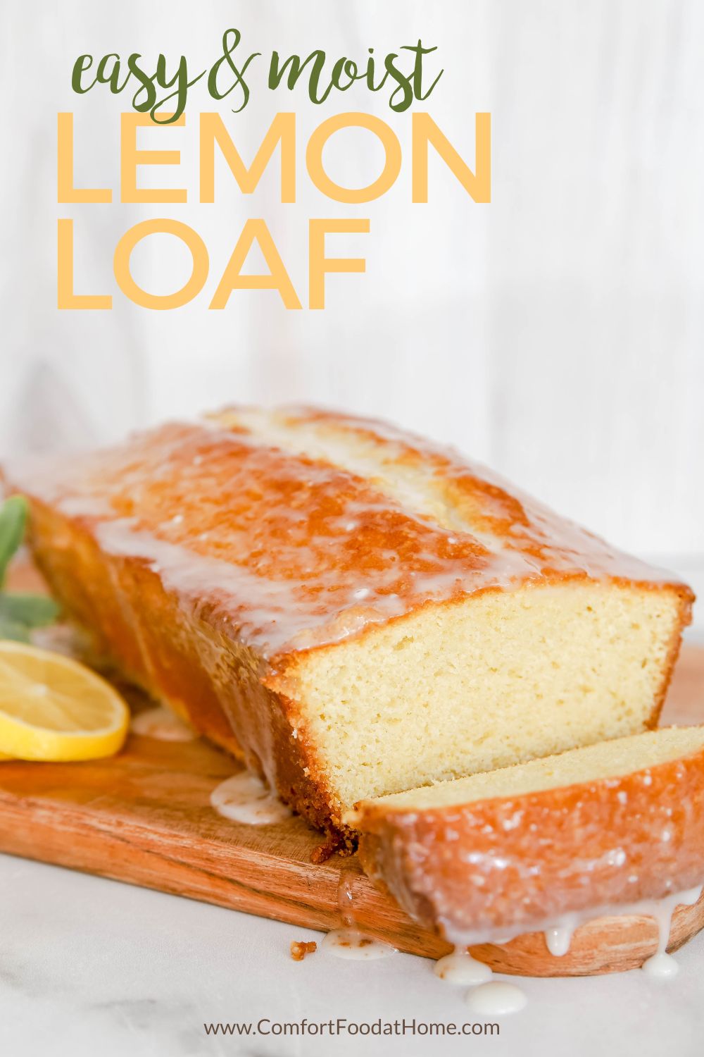 easy and moist Lemon loaf on a wooden board.