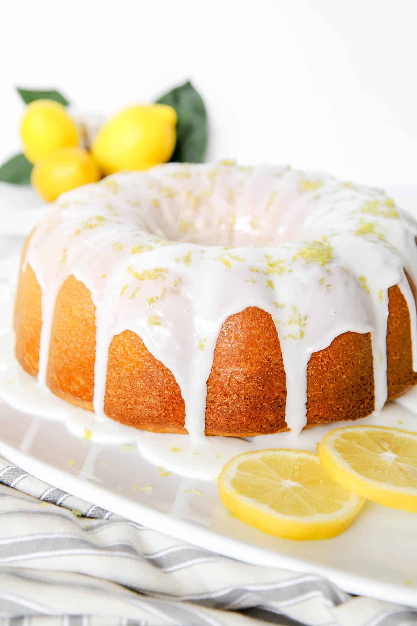 Lemon Bundt Cake with icing and lemon zest topping.