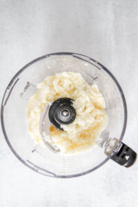 combined sugar and lemon zest in food processor.