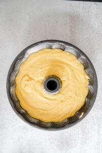 raw lemon cake batter in Bundt pan.