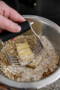 making the streusel topping for apple crisp muffins.