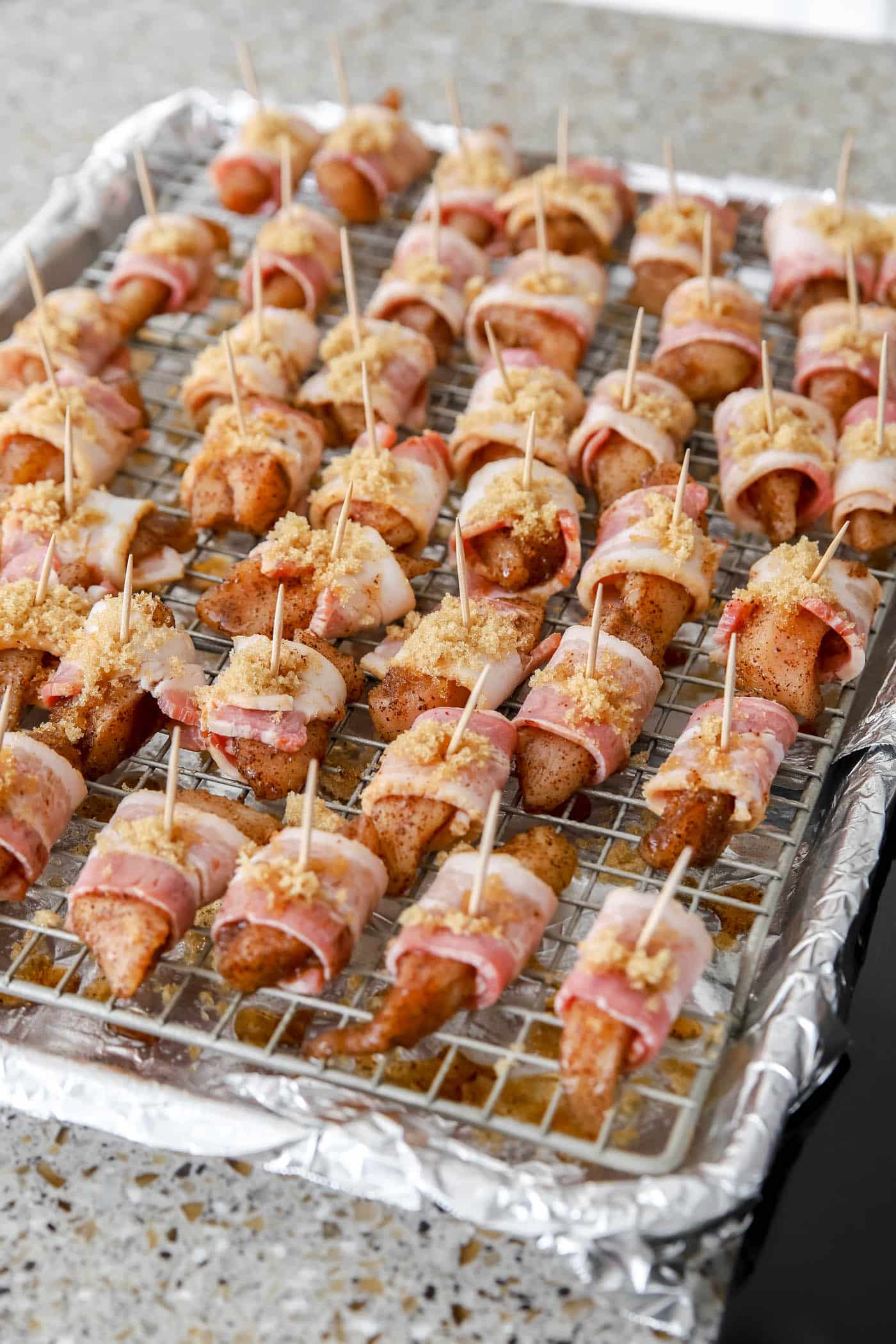 bacon-wrapped chicken bite appetizers before cooking.