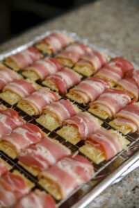 wrap bacon around crackers with cheese