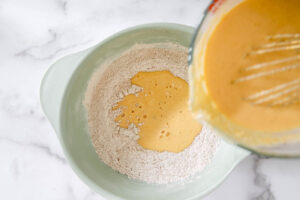 pumpkin waffle dry ingredients and mixing with wet ingredients.