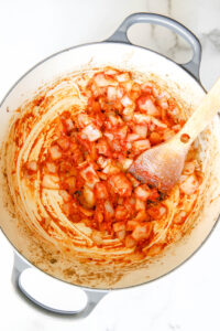onions, garlic and tomato paste for beef stew.