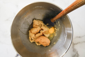 mix ingredients in a stand mixer for monster cookies.
