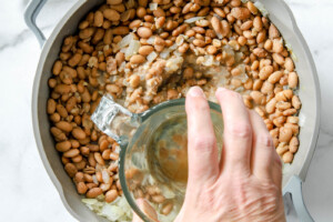 mash beans with bottom of a cup for refried beans.