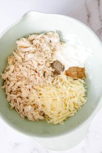 chicken enchiladas filling in a bowl.