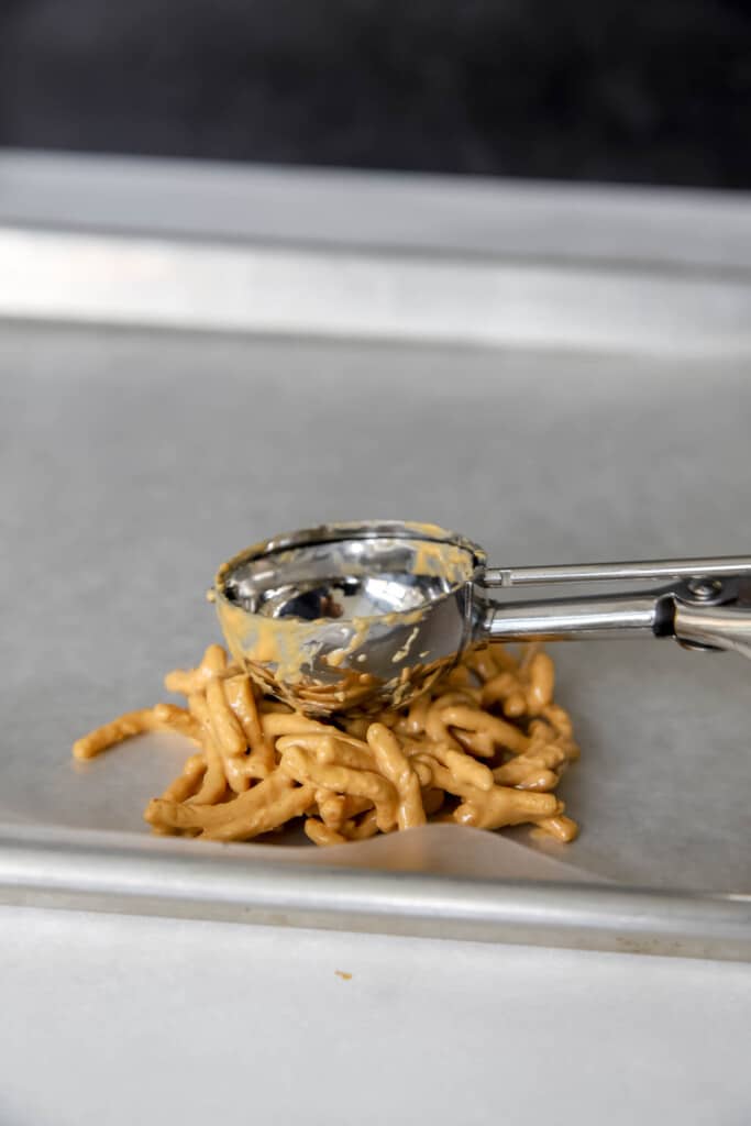 use a cookie scoop to make a well in candy nest treats for Easter