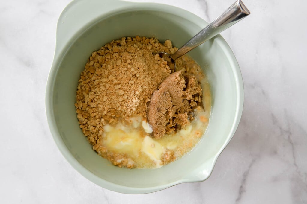 mix graham crackers, butter and sugar.