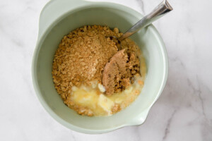 mix graham crackers, butter and sugar.