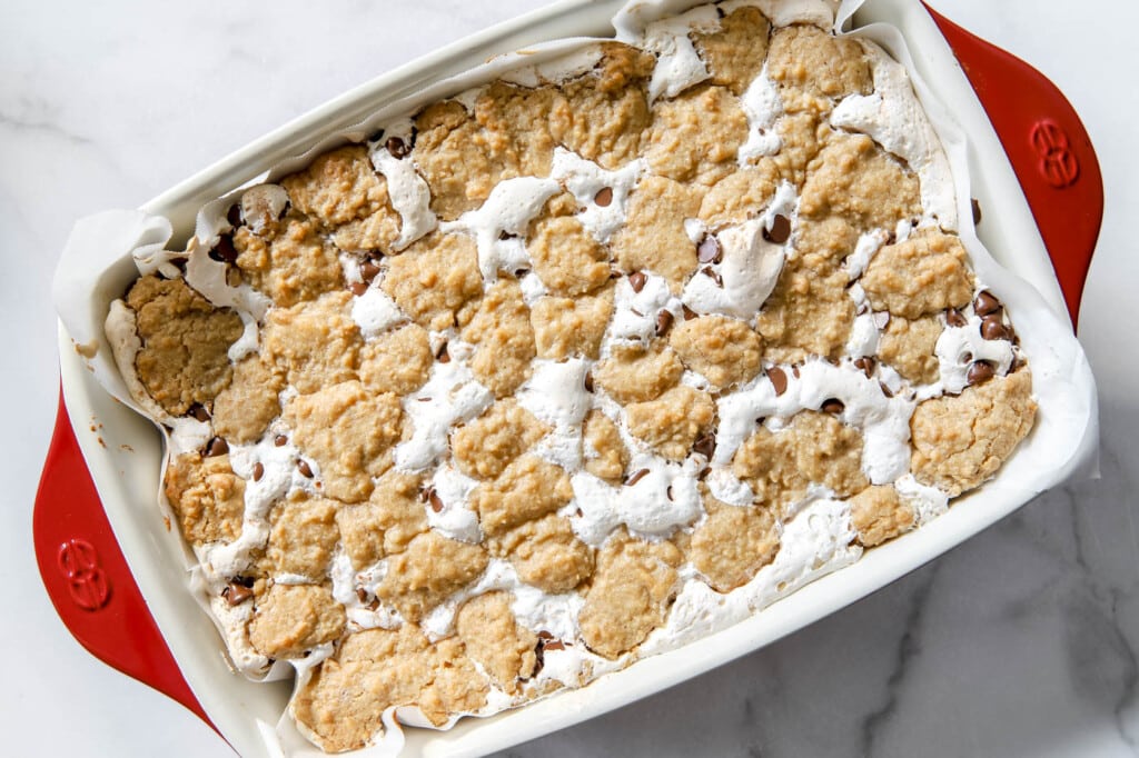 Top cookie and marshmallow layer for s'mores bars.